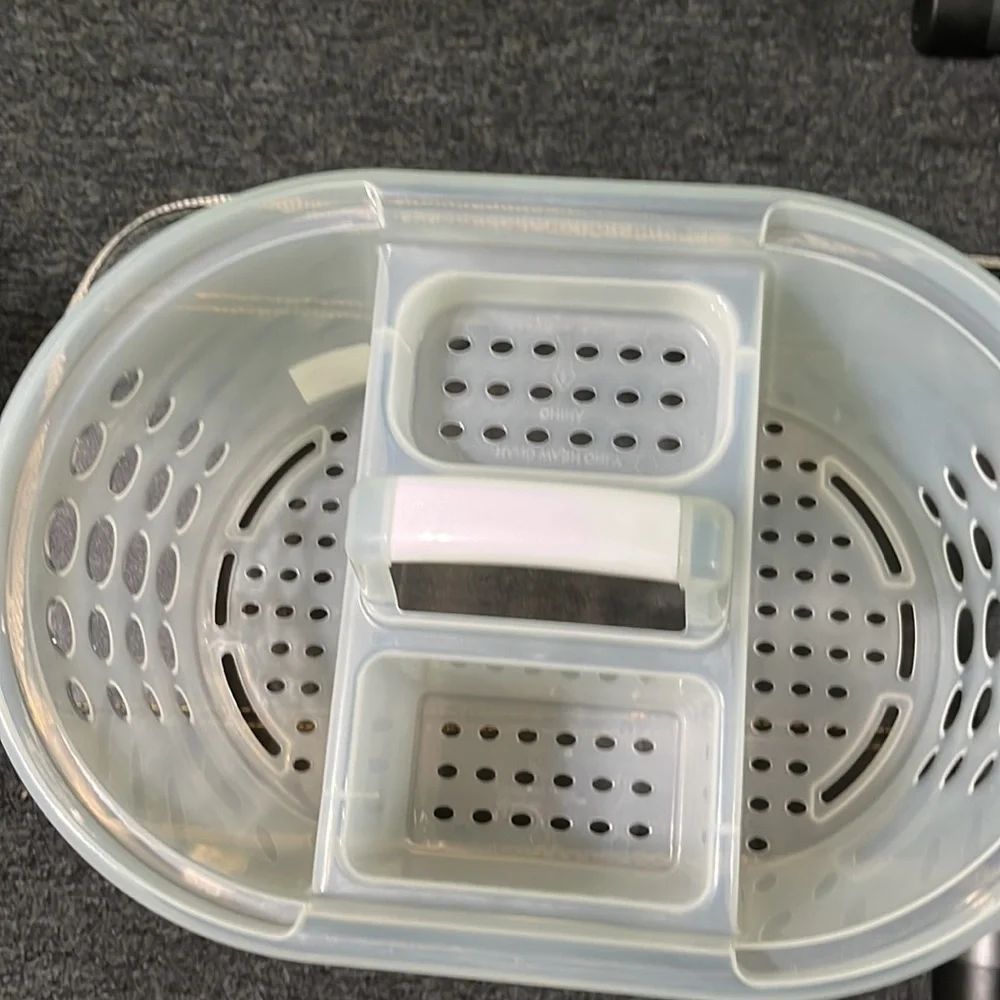 Bath caddy never used. Great for dorms.
